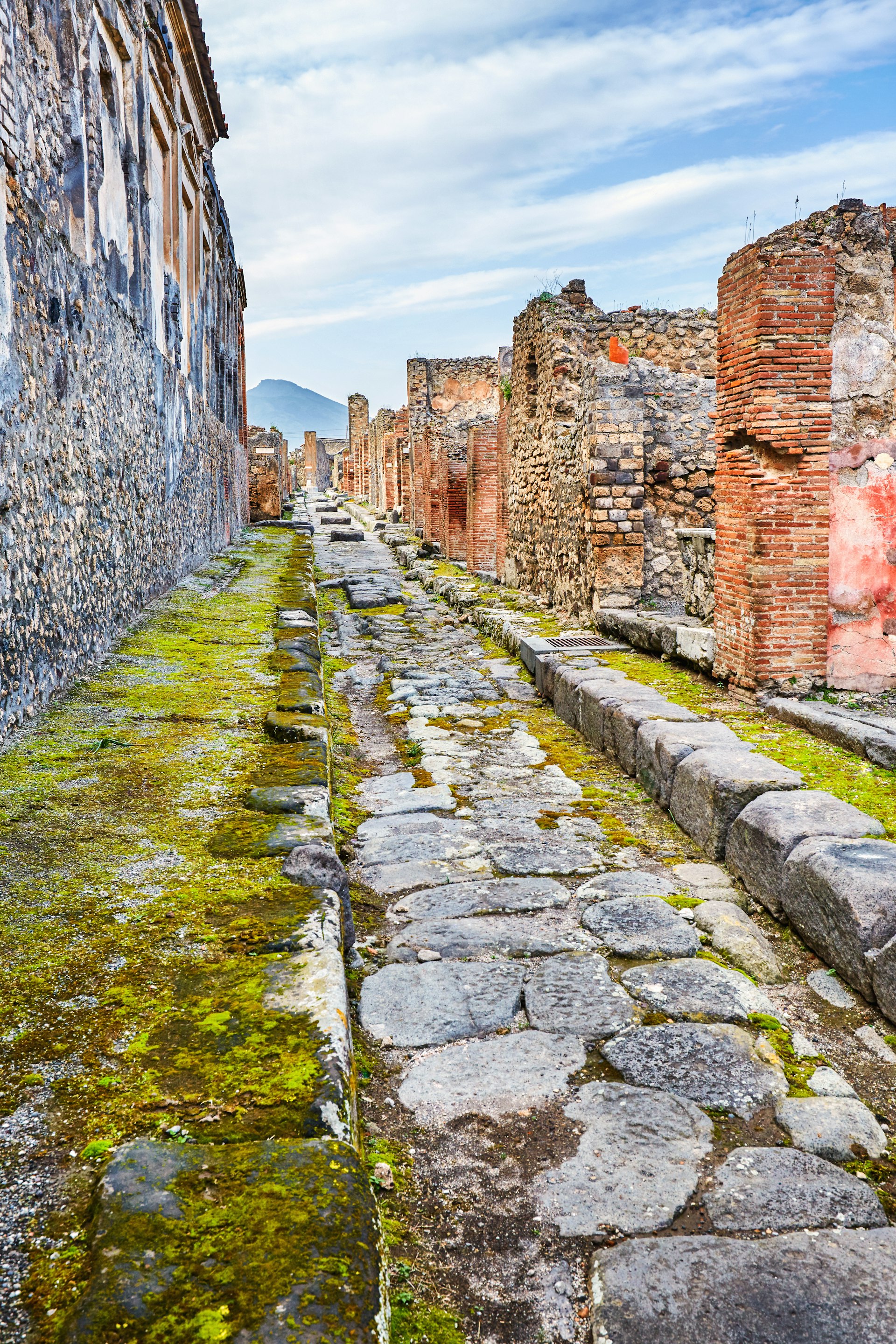 Empty street through the ruins of the ancient city of Pompeii, Italy